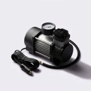 The 12 volt car inflator with its power cable and pressure gauge
